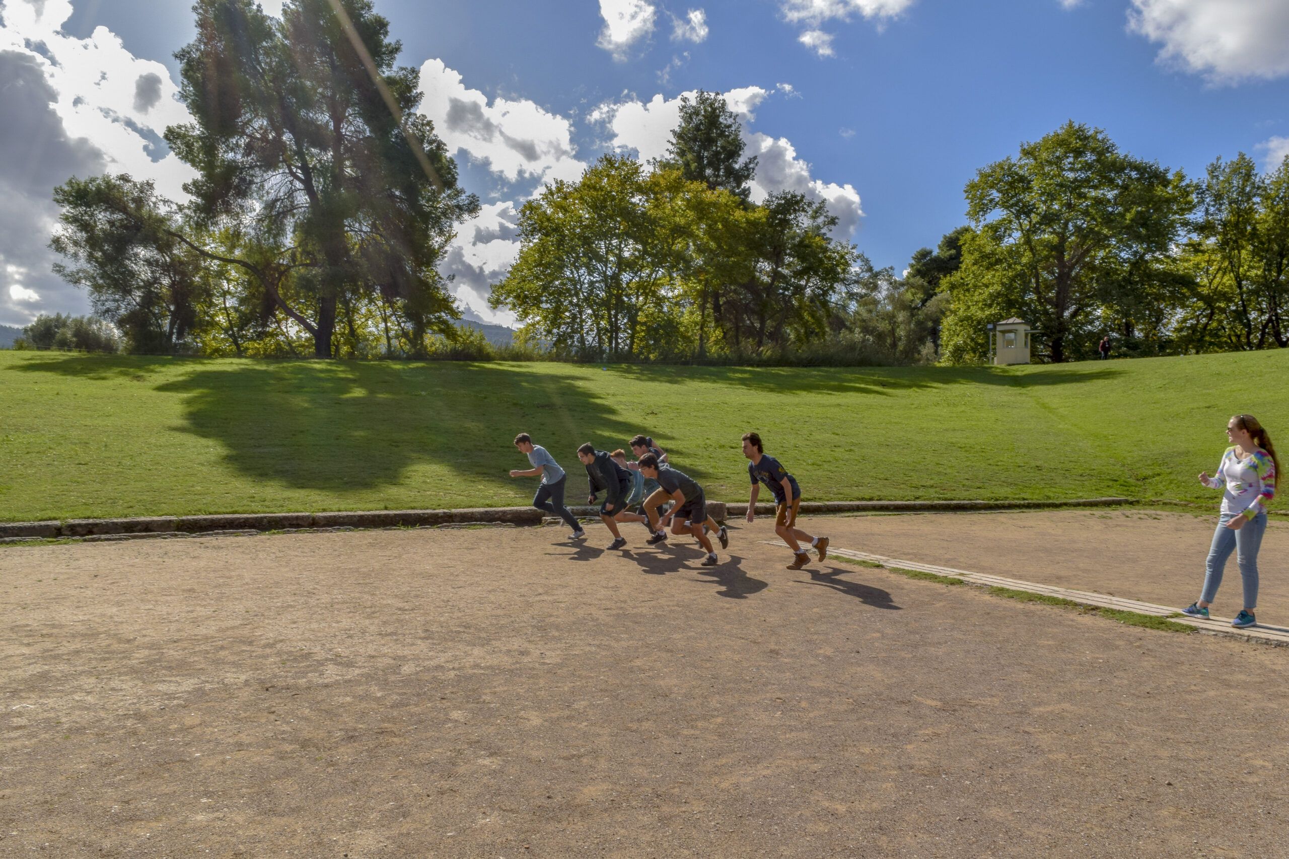 CYA - College Year in Athens 3. CYA Students Running on the stadium of ancient Olympia scaled